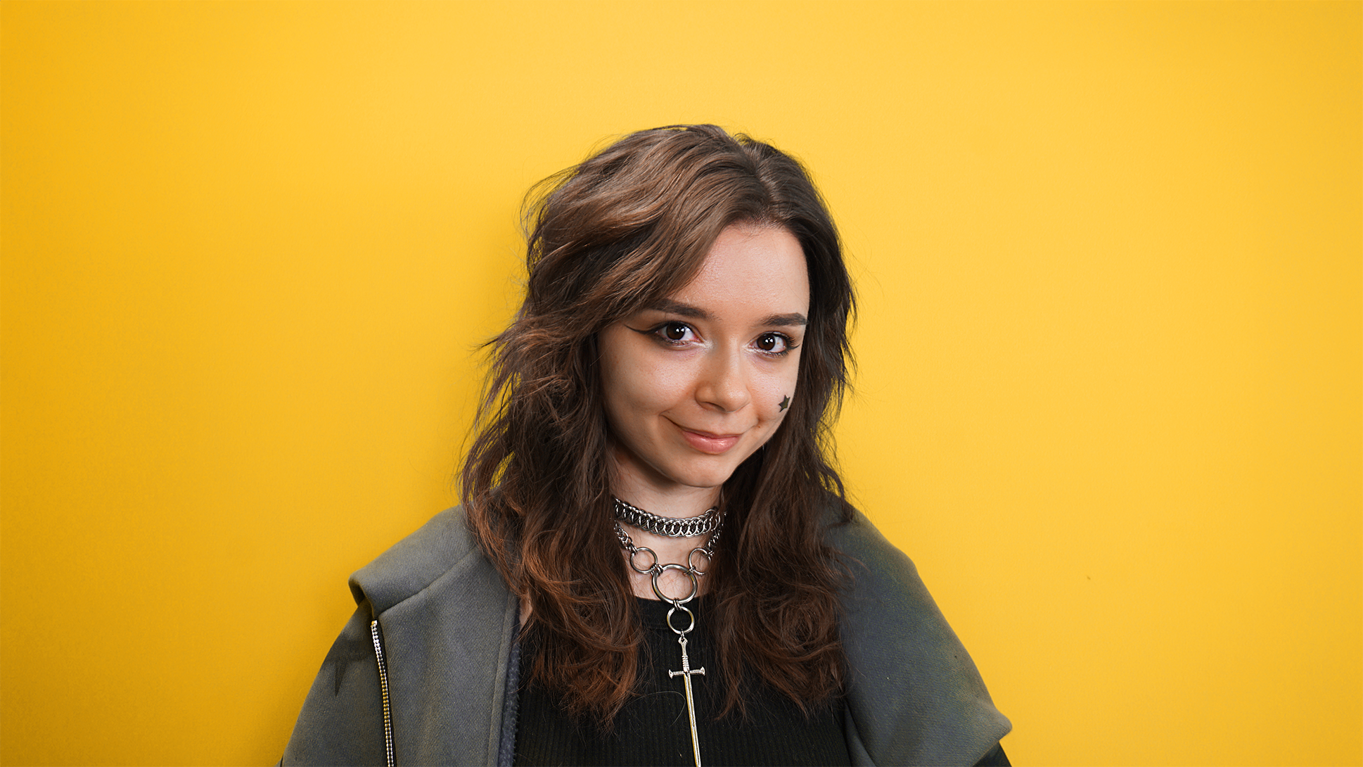 Image of Csilla Budai on a yellow background